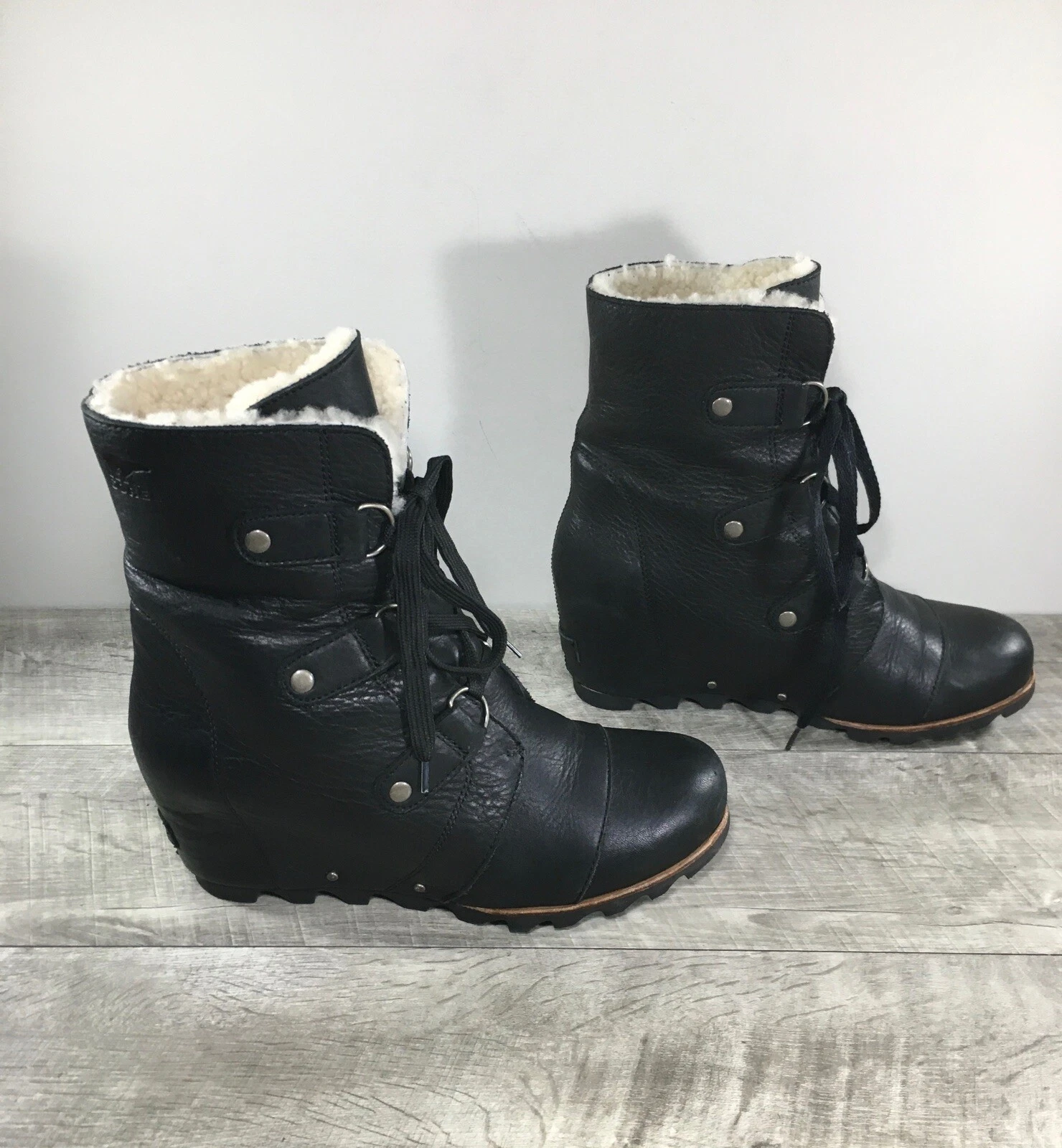 sorel joan of arctic wedge mid shearling lace up boots