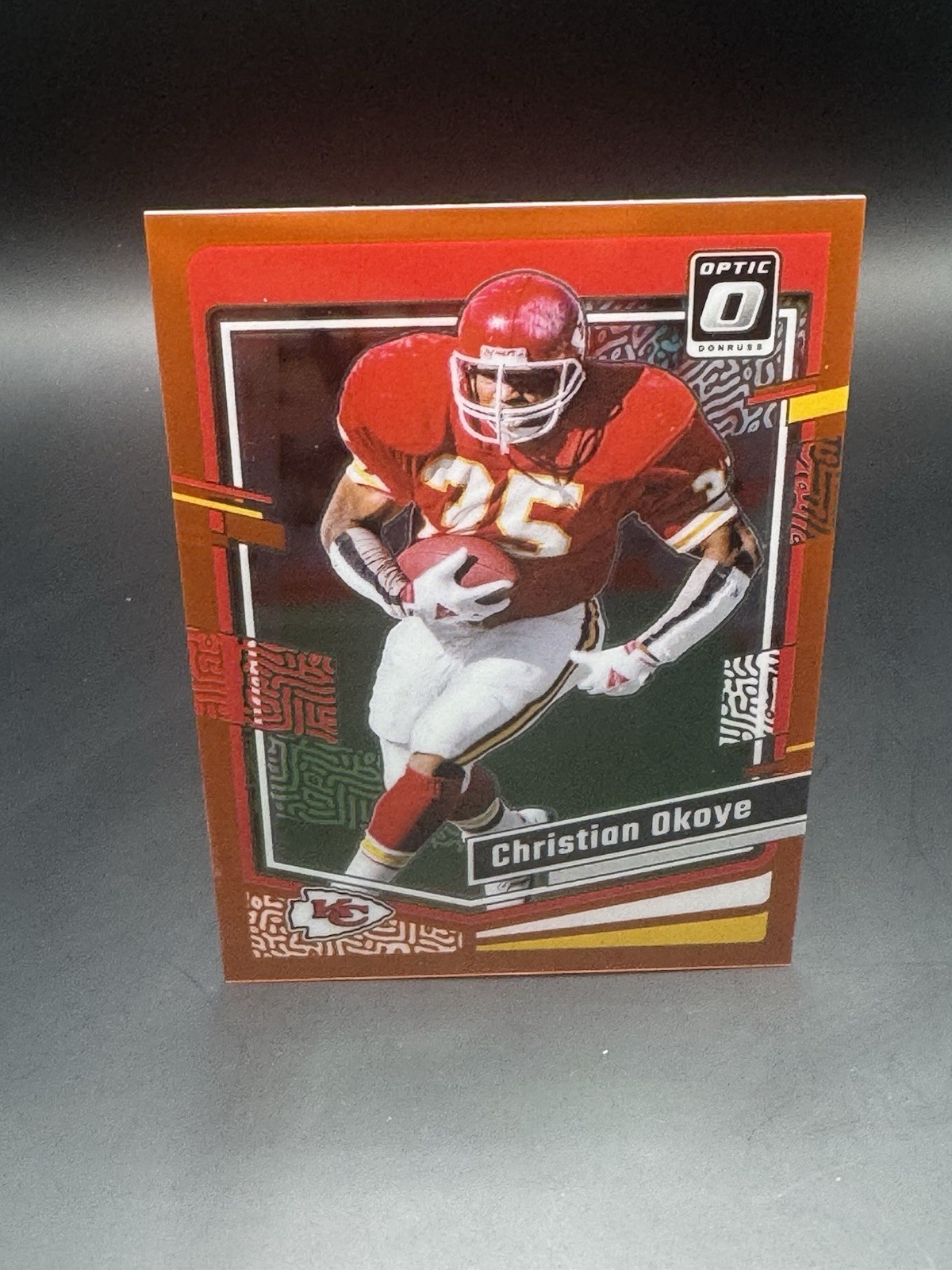 2023 Panini Donruss Optic Christian Okoye Orange Prizm 43/249 Chiefs #89