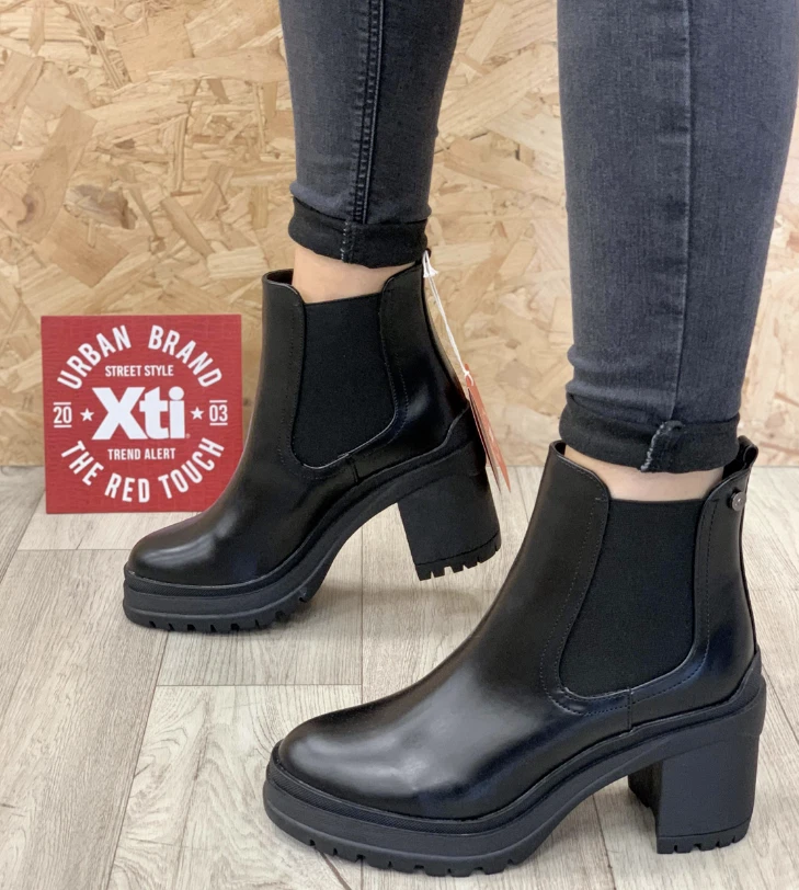 Ankle boots with elastic sides sale