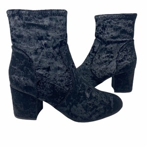 very volatile black booties