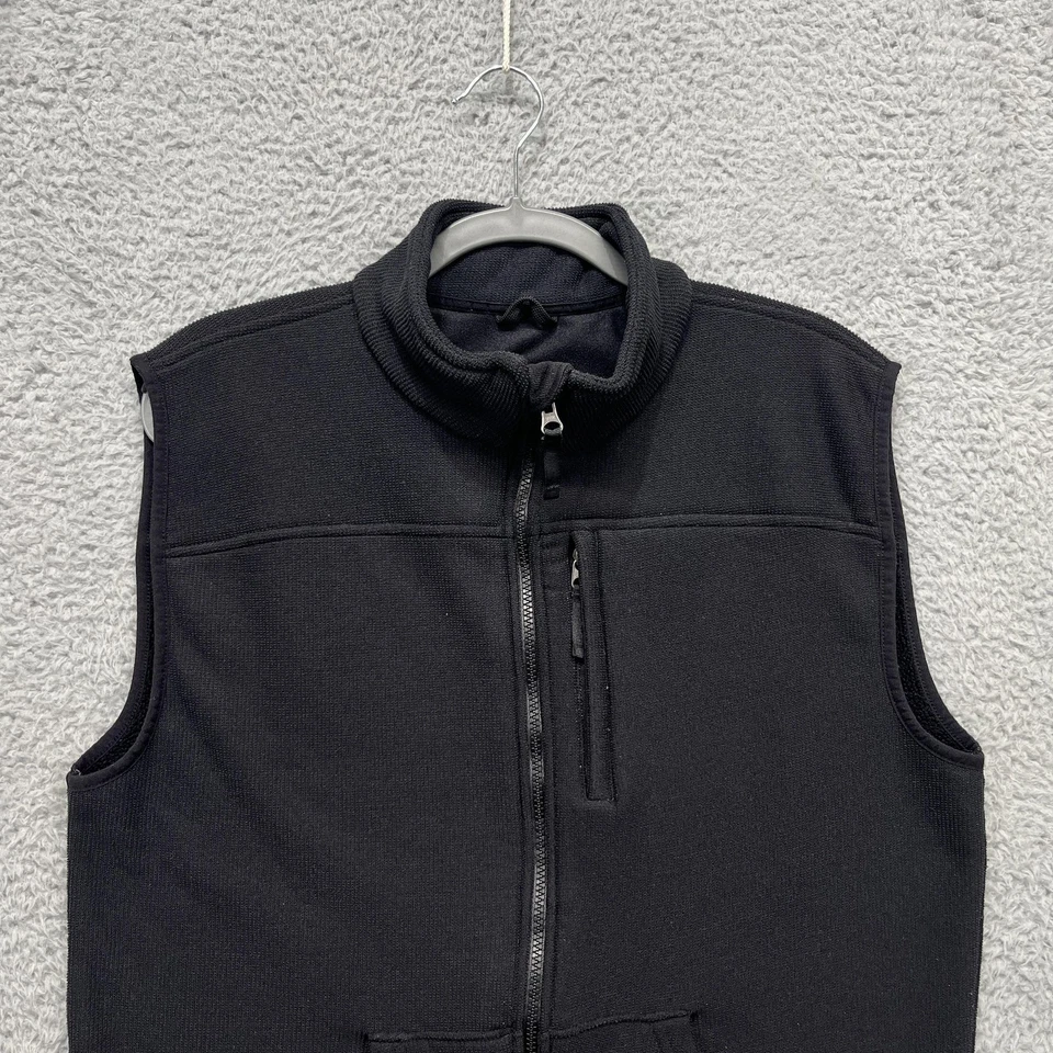 Chaleco Carhartt Para Hombres Mediano Negro Forrado de Vellón Cuello Simulado Cremallera Completa Logo V28 NEGRO Foto 2 de 4