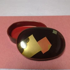 Red and black lacquerware trinket box with gold leaf decoration, Echizen