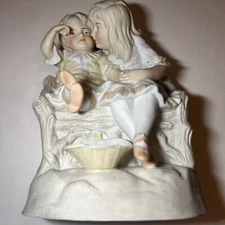 Antique 2 Children On Bench Figurine. Handle On Basket Broken 9 1/2 Inches Tall 