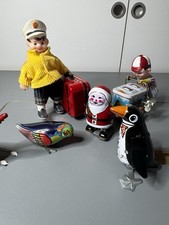 Konvolut 6 x  Blechspielzeug Ente Pinguin Eisverkäufer Kofferträger