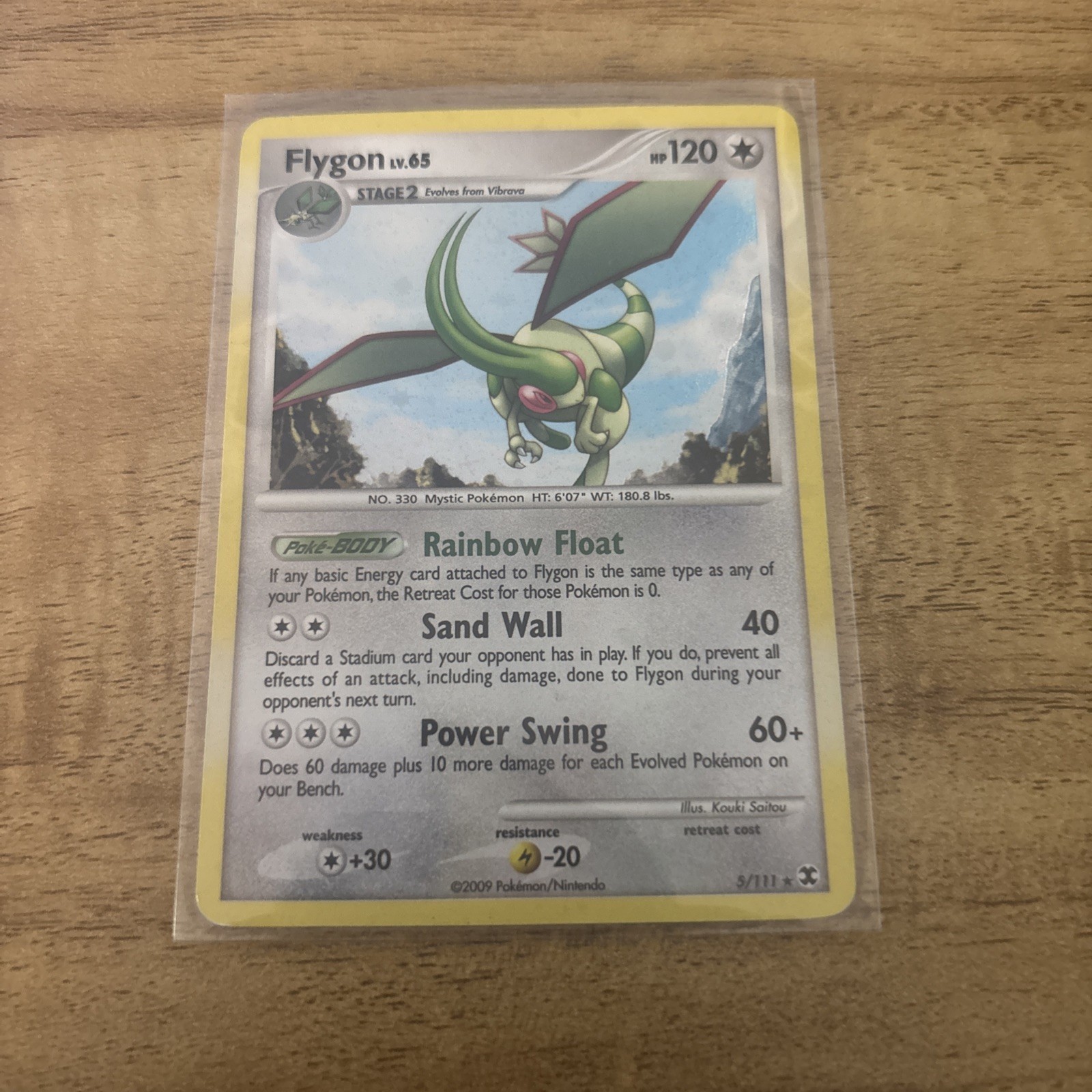 FLYGON  lv. 65  [5/111]  Rising Rivals - HOLO Pokemon Card