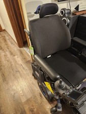 power wheelchair all track Amy System, black in color.