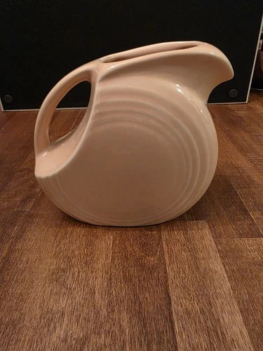 Apricot Fiestaware USA Pitcher. 5 1/2H.  2 3/4 Base