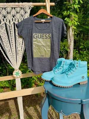Turquoise Timberland Boots and Guess Tee Shirt