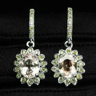 Entrancing Peach Sapphire Oval 4.70Ct 925 Sterling Silver White Gold Earrings