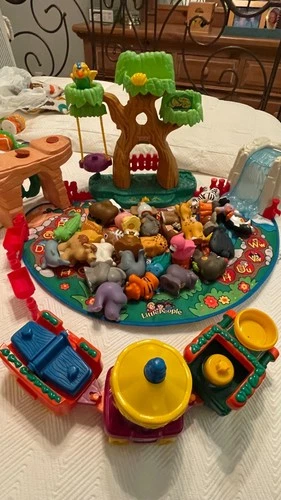 vintage fisher price alphabet animal mat with matching train. All pieces there