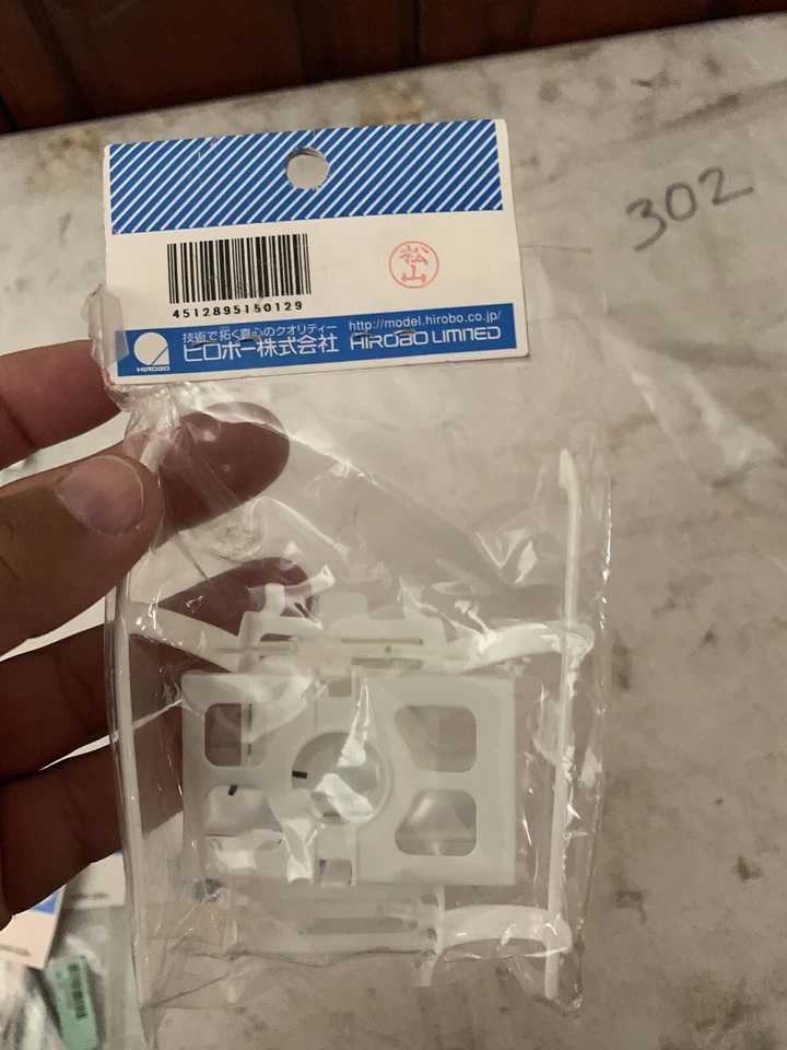 Vintage HIROBO 0302-024 SRB SKID AND BATTERY HOLDER #0302024 HELICOPTER PARTS - Image 2 of 3