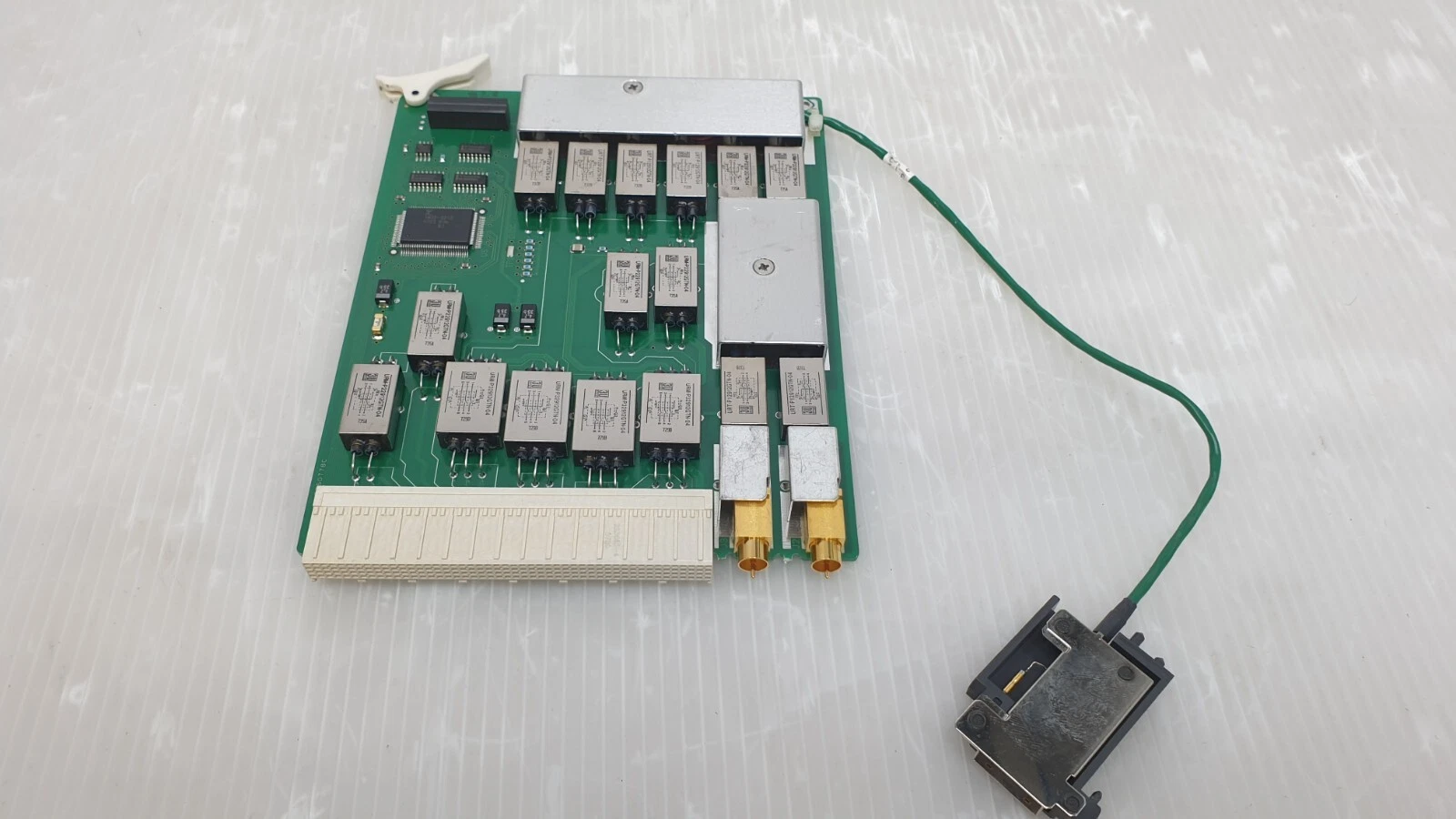 Agilent E3121-66511 board from above with shields, modules and attached connector block