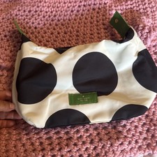 Kate Spade black, white, and green cosmetic bag, 8 inches wide