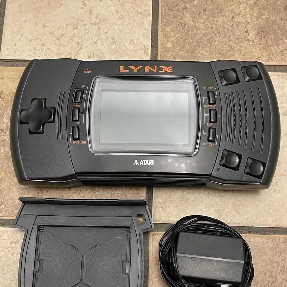 Sistema portátil Atari Lynx II PAG-0401 con cubierta de batería + cable de alimentación FUNCIONAMIENTO PROBADO Foto 2 de 4