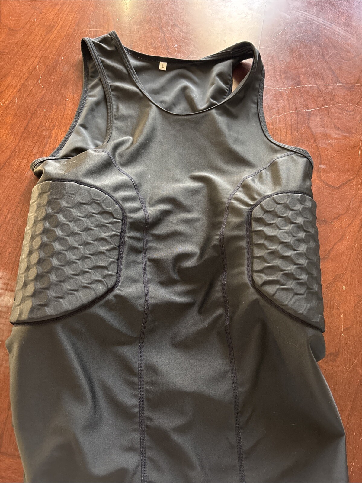 Athletic protective gear sleeveless shirts