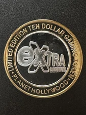 $10 Planet Hollywood 2009 “Extra Lounge” Clad Silver Strike, Las Vegas, NV.