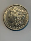 1887-0 MORGAN SILVER DOLLAR (ABOUT UNCIRCULATED)
