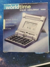 Collapsible Travel Alarm clock, calculator, world time, calendar, 3.5” Folded