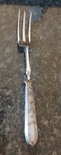 Ancienne fourchette de service en métal argenté poinçonné mesurant 29 cm