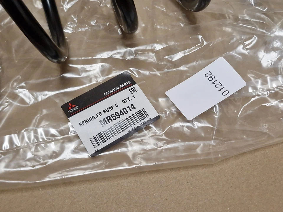 Muelle helicoidal delantero Mitsubishi Colt Z30 2002-2012 MR594014 genuino nuevo OEM Foto 2 de 4