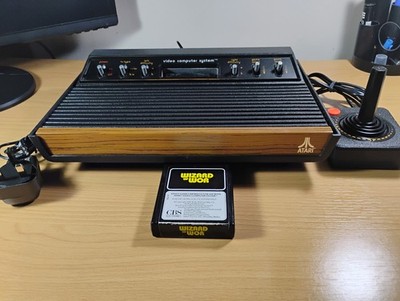 Atari 2600 6 Switch Woody Konsole mit WIZARD OF WOR - voll funktionsfähig
