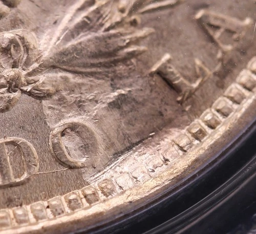 1921-P  Morgan Silver Dollar $1 NGC MS 62 "Obverse Lamination & Struck Thru Rev"