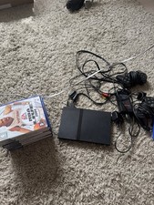 Sony PlayStation 2 Slim Console With games and 2 controllers