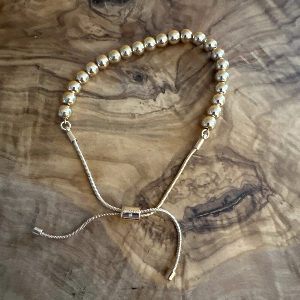 Pulseira J Crew 6mm tom dourado com miçangas bola deslizante ajustável - Imagem 3 de 4
