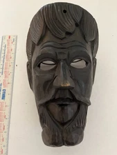 Antique hand-carved wooden mask. Country of origin unknown, Possibly Hispanic