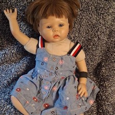 Baby Girl Doll Brown Straight Hair Blue Eyes Light Complexion Floral Dress