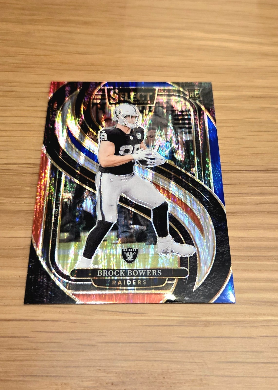 2024 Panini Select Brock Bowers Premier Level Red White Blue Prizm Shock RC #118