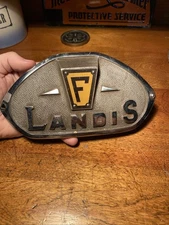 Vintage F Landis Equipment Badge Cover Shield Cast