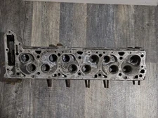 Mercedes 180 010 20 20 Cylinder Head with 4 550 on it. 