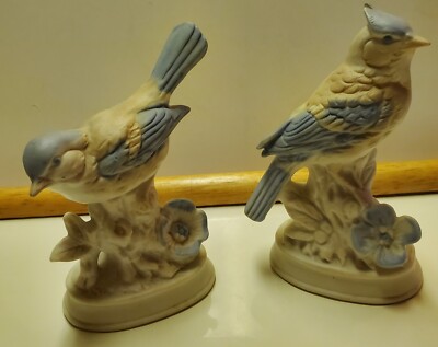 Pair of blue bird figures