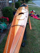 A LAUGHING LOON NORTH STAR Strip cedar Baidarka kayak.
