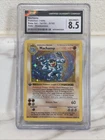 Pokemon 1999 Machamp Base Set Shadowless 1st Edition 8/102 CGC 8.5 Nm/mint +