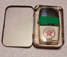 Vintage Scripto VU Lighter Texaco Oil  with Green Band New in Tin.
