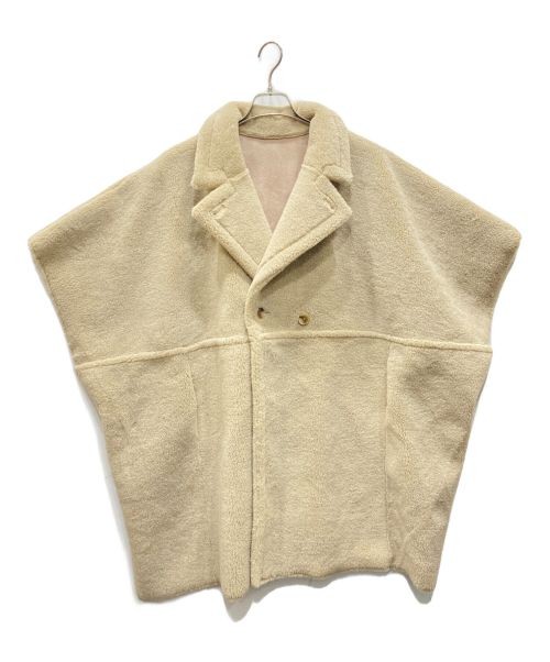 Ameri                    REVERSIBLE BOA PONCHO CO… - image 1