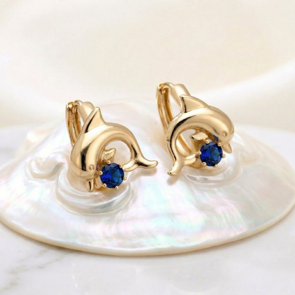 Créoles dauphin plaqué or jaune 750 et fins zircons bleus azur