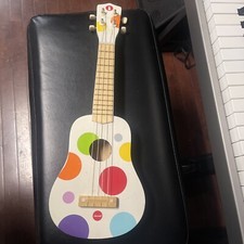 UKULELE CHILDS GUITAR JANOD JURATOYS WHITE WITH POLKA DOTS SPOTS USED 4 STRING.
