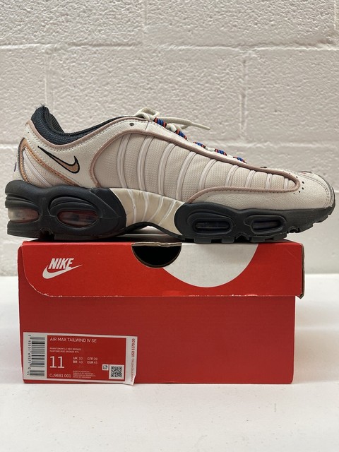 nike tailwind orange blue