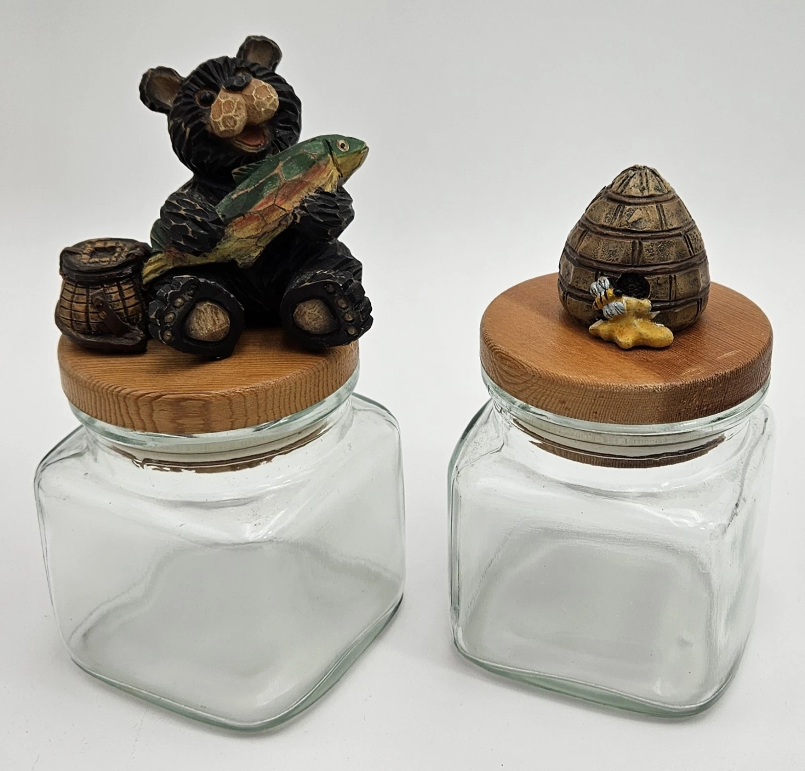 2 Vintage Glass Cannisters-Rustic-Figural Lids-Black Bear W/ Fish & Bee Skep