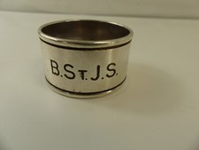 (RefJOH32C) Silver plated napkin ring with initials B.St.J.S