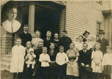 LARGE FAMILY GROUP PHOTO, EXTERIOR. PHOTO OF CHILD ADDED, UPPER LEFT.