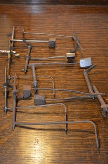 SEECTION OF LONG CASE CLOCK MOVEMENT PARTS BELL STRIKERS BELL HAMMERS ETC.