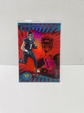 2024 Panini Illusions - Travis Etienne #39 Trophy Collection Ruby /125