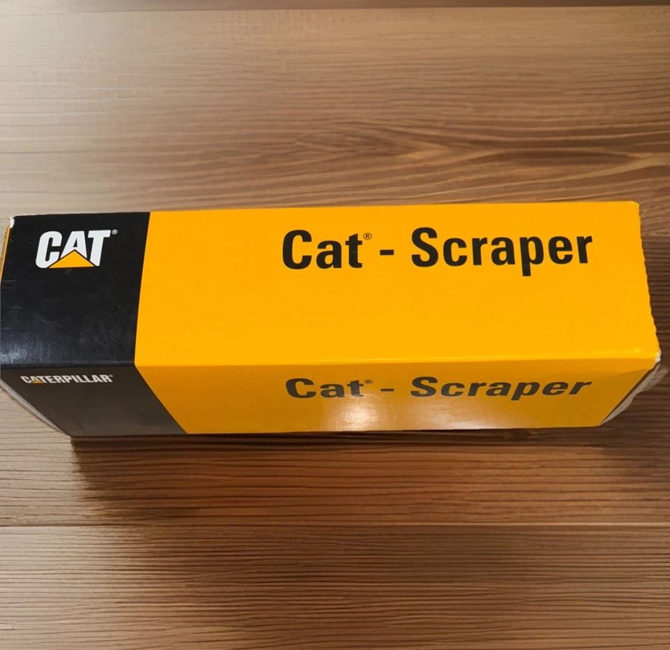 Rascador Caterpillar Cat 627 - Amarillo - NZG escala 1:50 modelo fundido a presión #127 Foto 2 de 3