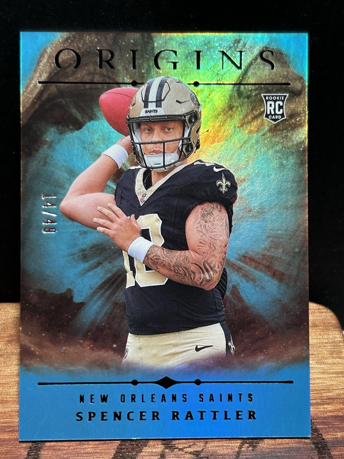 2024 Panini Origins Football Spencer Rattler 114 Holo Turquoise /49 RC