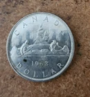 1962 uncirculated Canadian 80% silver dollar
