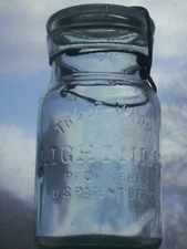 ground lip 1 pt. trade mark Lightning Registered U.S. Patent Office canning jar